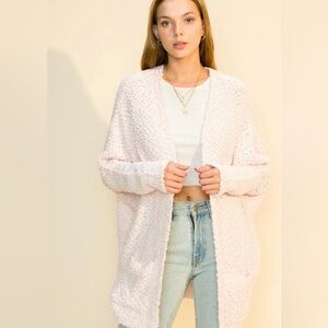 Cozy and comfortable light pink sweater/cardigan